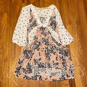 Gorgeous two patterned Free People dress! Has a string tie to cinch waist.